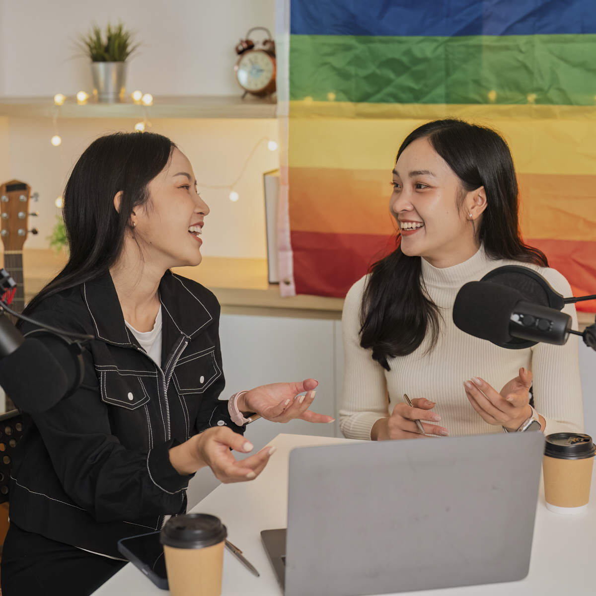 Inclusive conversation between LGBTQIA friends in a podcast studio